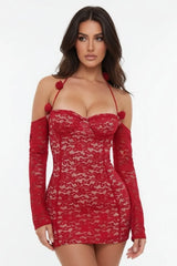 Close-up of short red lace dress with long sleeves and sweetheart neckline for women
